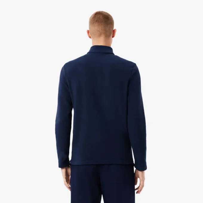 Jersey de golf de forro polar con cremallera de un cuarto para hombre
