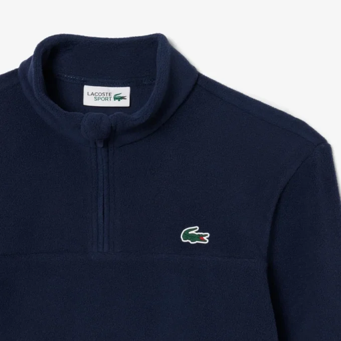 Jersey de golf de forro polar con cremallera de un cuarto para hombre