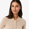 Jersey de lana merina con cuello polo y punto elástico 3D