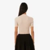 Jersey de lana merina con cuello polo y punto elástico 3D