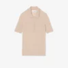 Jersey de lana merina con cuello polo y punto elástico 3D