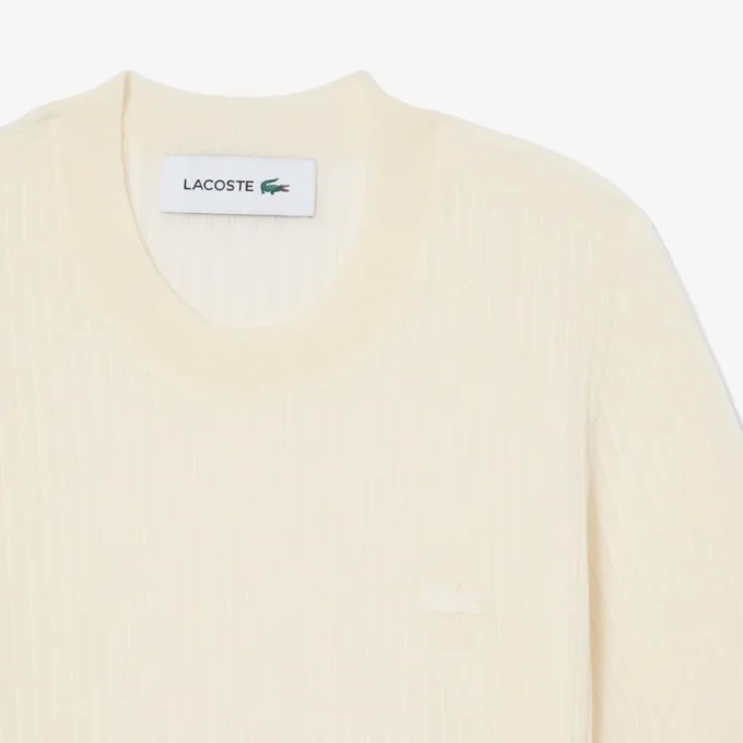 Jersey de punto acanalado de lana merina de manga corta para mujer