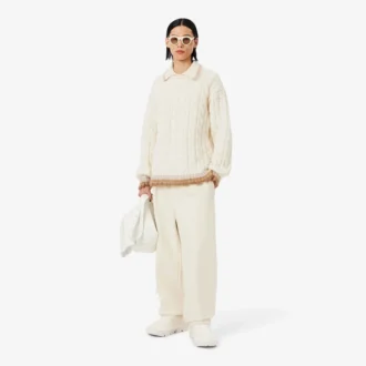 Jersey de punto trenzado con cuello polo de lana de pasarela