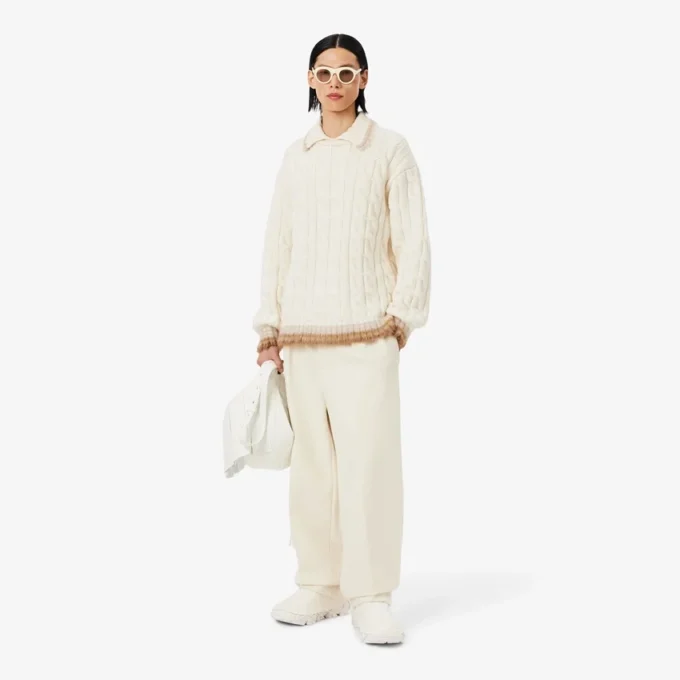 Jersey de punto trenzado con cuello polo de lana de pasarela