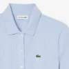 Mono con cuello polo de piqué elástico