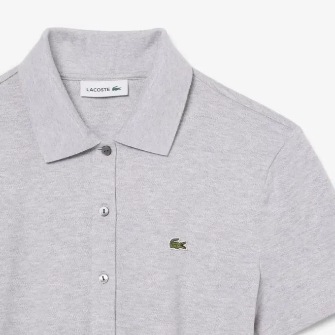 Mono con cuello polo de piqué elástico