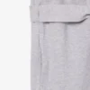 Mono con cuello polo de piqué elástico
