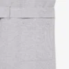 Mono con cuello polo de piqué elástico