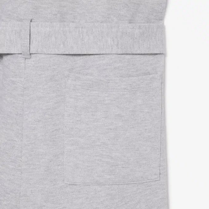 Mono con cuello polo de piqué elástico