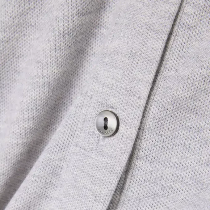 Mono con cuello polo de piqué elástico
