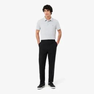 Pantalones chinos elásticos de corte regular