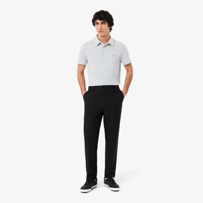 Pantalones chinos elásticos de corte regular