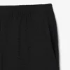 Pantalones chinos elásticos de corte regular