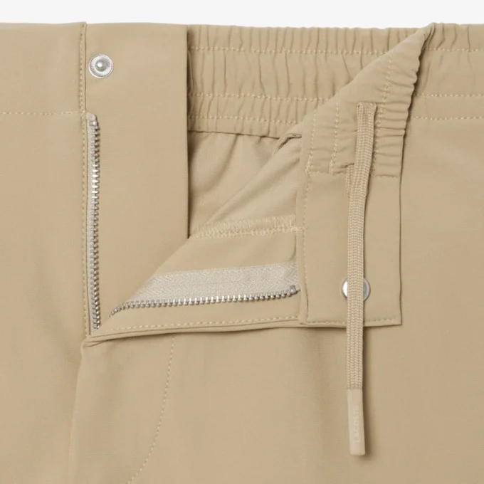 Pantalones chinos elásticos de corte regular