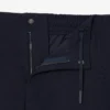 Pantalones chinos elásticos de corte regular