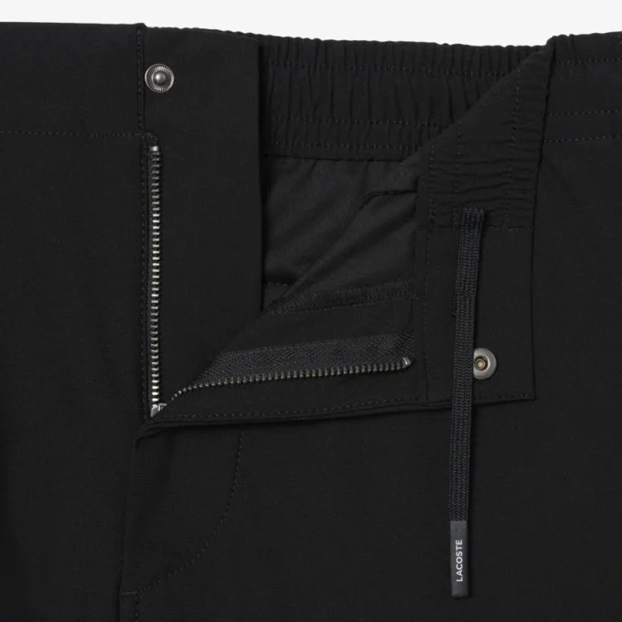 Pantalones chinos elásticos de corte regular