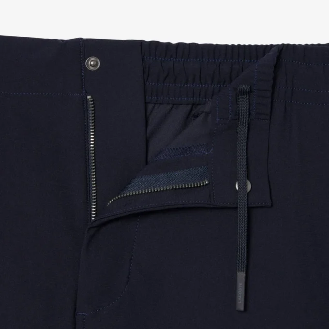 Pantalones chinos elásticos de corte regular