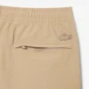 Pantalones chinos elásticos de corte regular