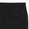 Pantalones chinos elásticos de corte regular