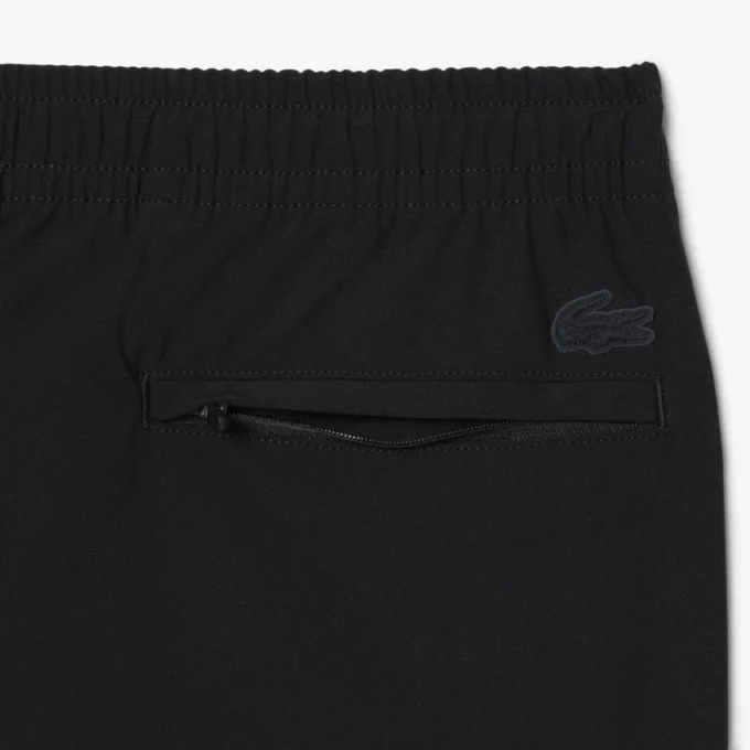 Pantalones chinos elásticos de corte regular