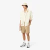 Pantalones cortos bermudas de sarga de algodón elástico de corte regular