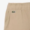 Pantalones cortos chinos de sarga de algodón elástica