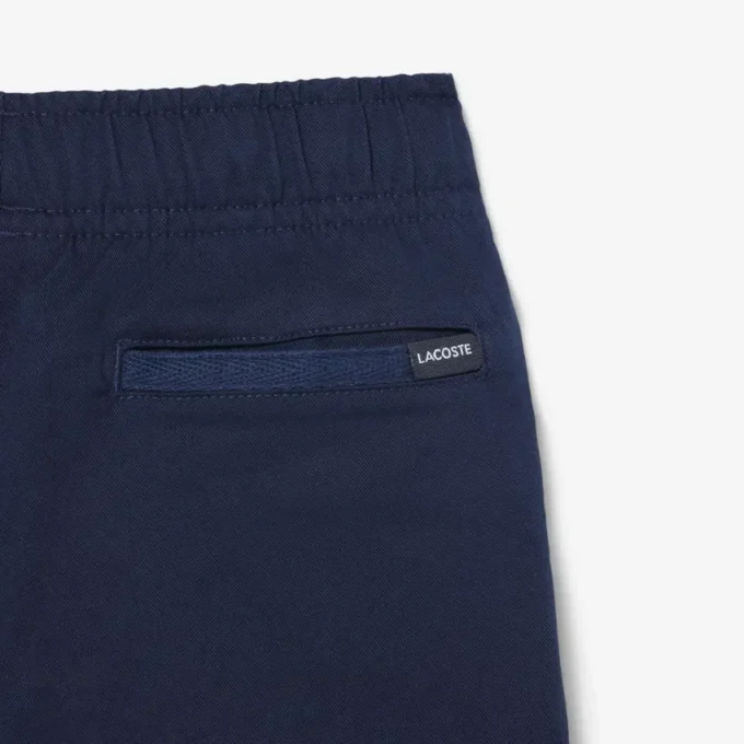 Pantalones cortos chinos de sarga de algodón elástica