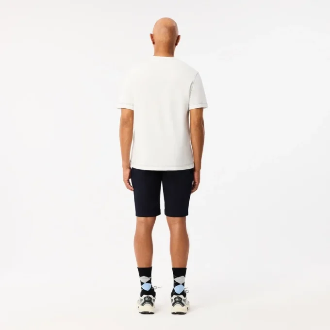 Pantalones cortos de algodón elástico de corte ajustado para hombre