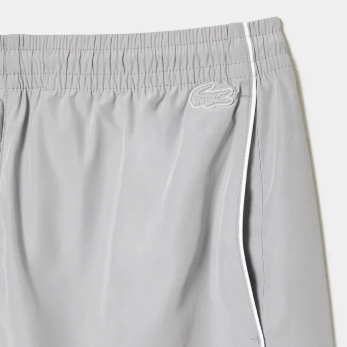 Pantalones cortos de corte holgado con bordados para hombre