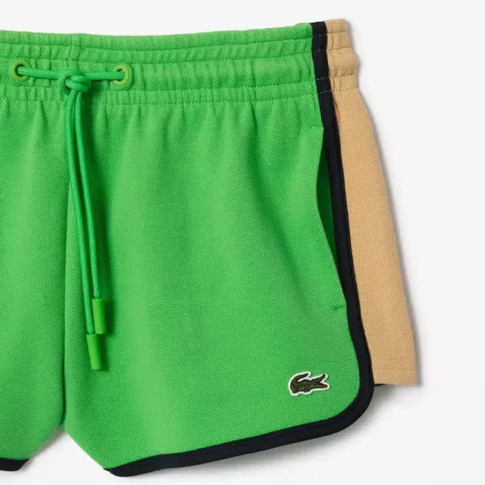 Pantalones cortos de piqué con paneles en contraste para mujer