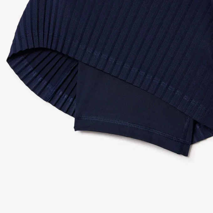 Pantalones cortos de tenis con pliegues y forro para mujer