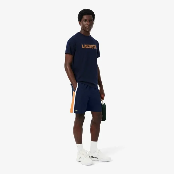 Pantalones cortos de tenis de hombre ligeros con rayas en bloques de color