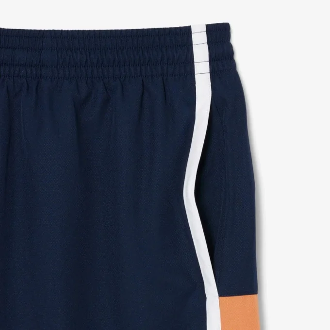 Pantalones cortos de tenis de hombre ligeros con rayas en bloques de color