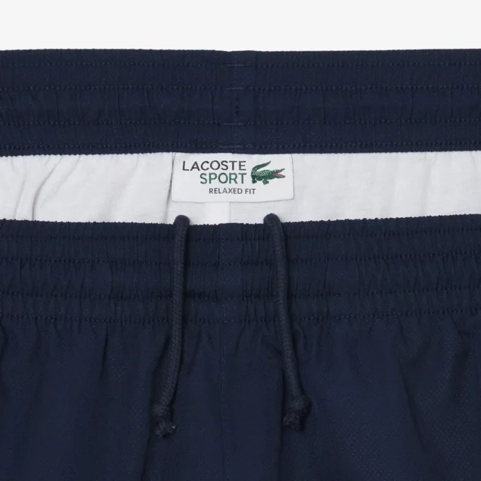 Pantalones cortos de tenis de hombre ligeros con rayas en bloques de color