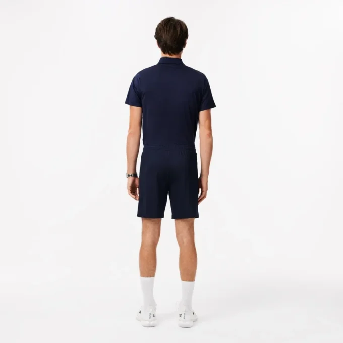 Pantalones cortos de tenis elásticos de corte regular para hombre