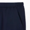 Pantalones cortos de tenis elásticos de corte regular para hombre