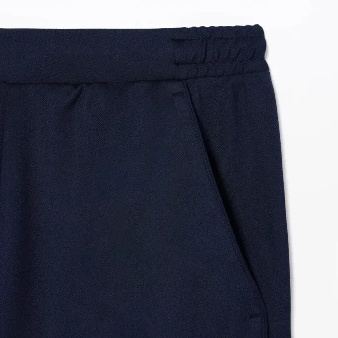 Pantalones cortos de tenis elásticos de corte regular para hombre