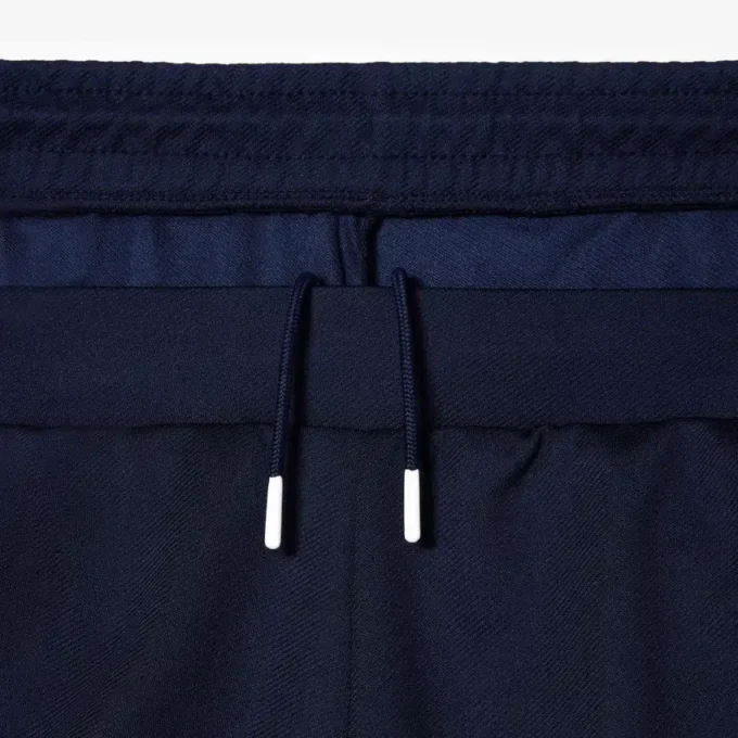 Pantalones cortos de tenis elásticos de corte regular para hombre