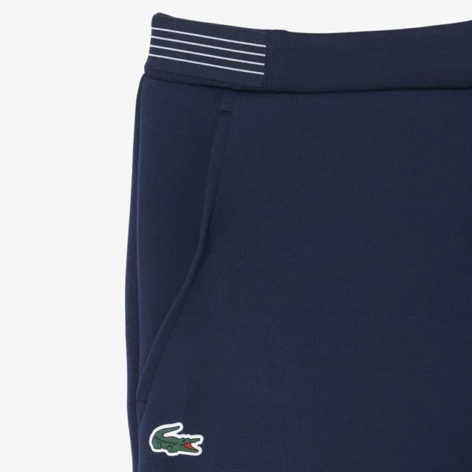 Pantalones cortos de tenis Heritage con detalle de insignia Ultra Dry