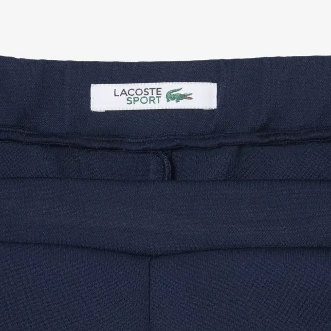 Pantalones cortos de tenis Heritage con detalle de insignia Ultra Dry