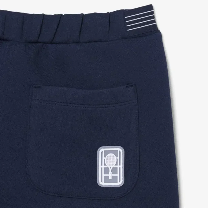Pantalones cortos de tenis Heritage con detalle de insignia Ultra Dry