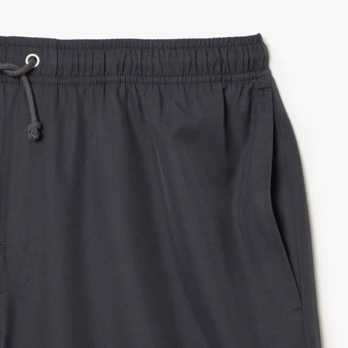 Pantalones cortos de tenis ligeros para hombre