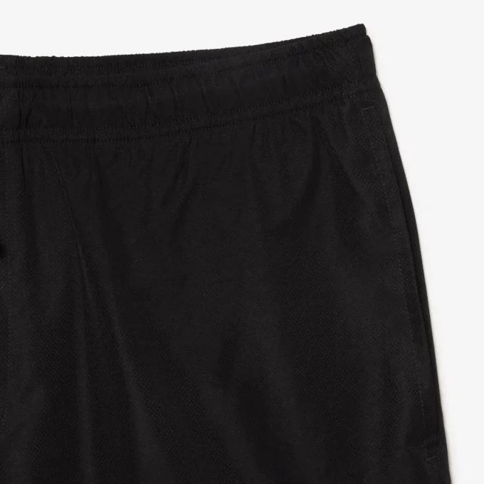 Pantalones cortos de tenis ligeros para hombre