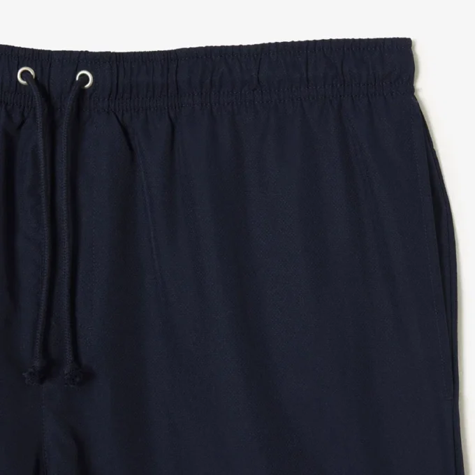 Pantalones cortos de tenis ligeros para hombre