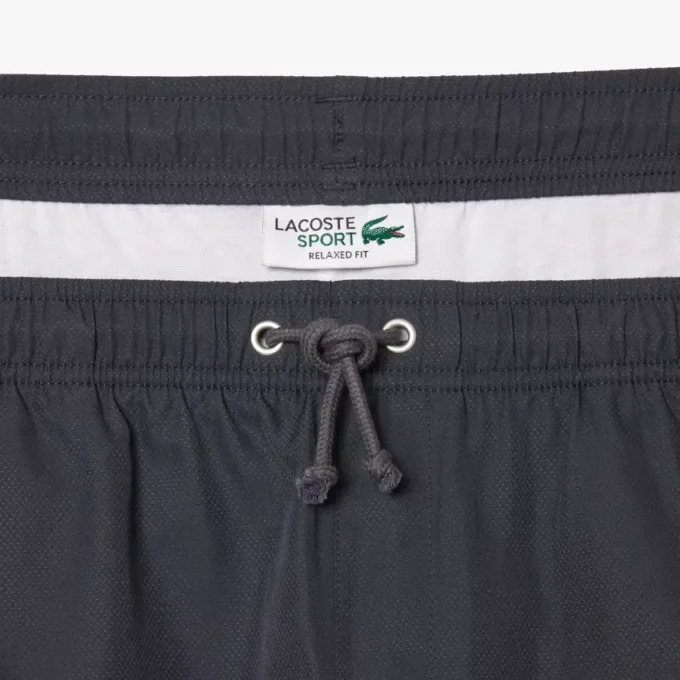 Pantalones cortos de tenis ligeros para hombre