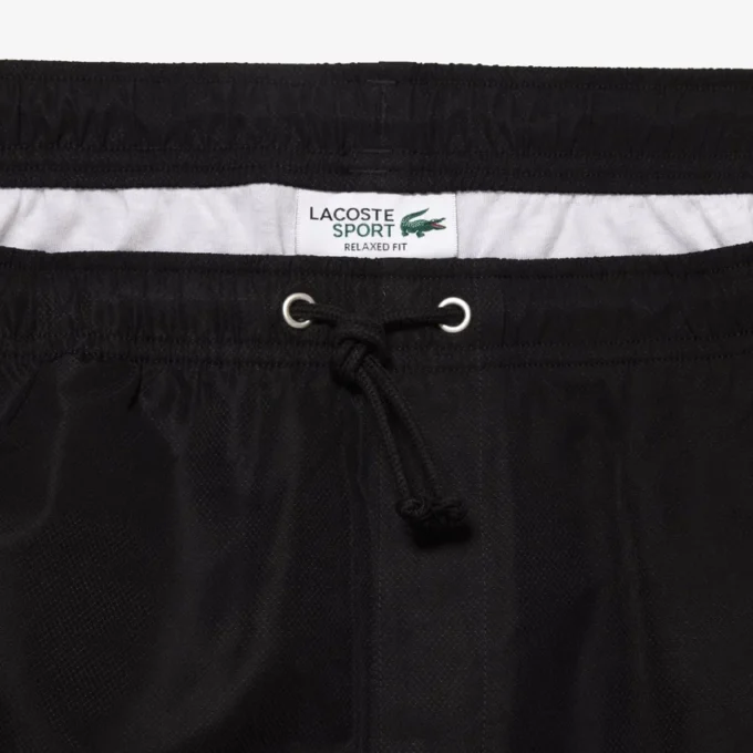 Pantalones cortos de tenis ligeros para hombre