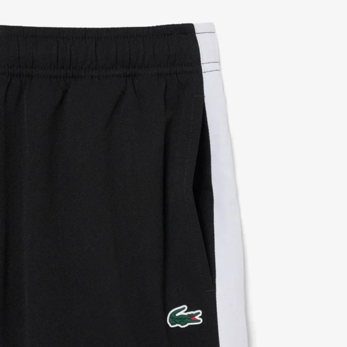 Pantalones cortos deportivos con bloques de color