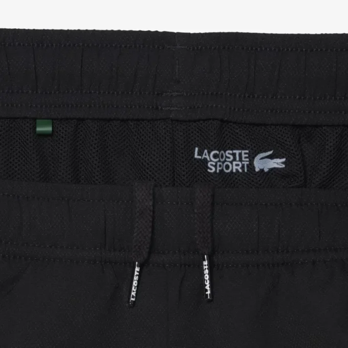 Pantalones cortos deportivos con bloques de color