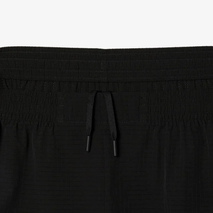 Pantalones cortos deportivos elásticos ligeros para hombre