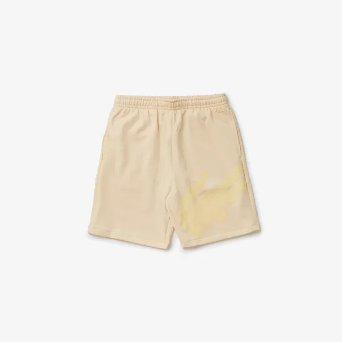 Pantalones cortos oversize de felpa de algodón orgánico con estampado de cocodrilo para hombre